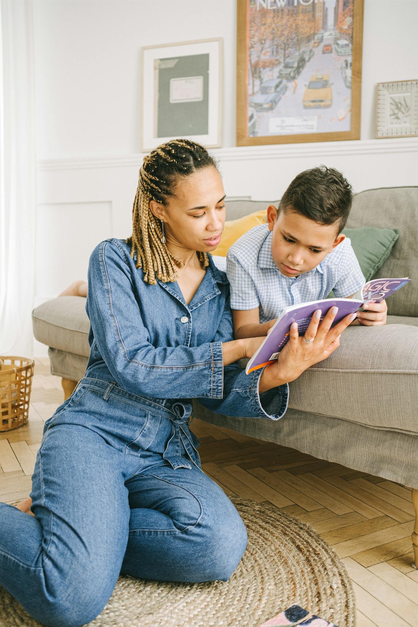 Mother and son enjoying quality reading time together indoors.